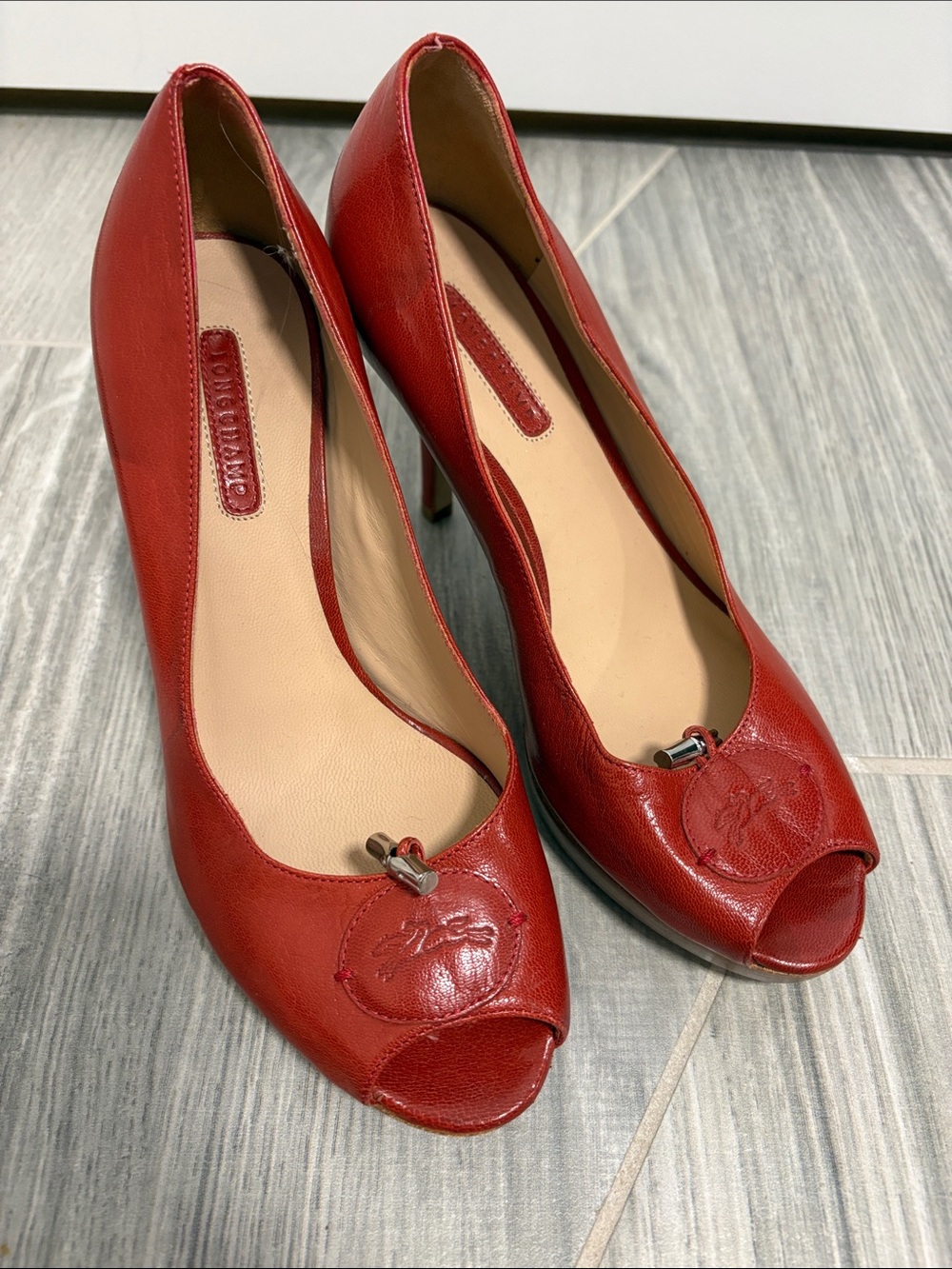 Longchamp Red Peep-Toe Leather Heels with Signature Medallion